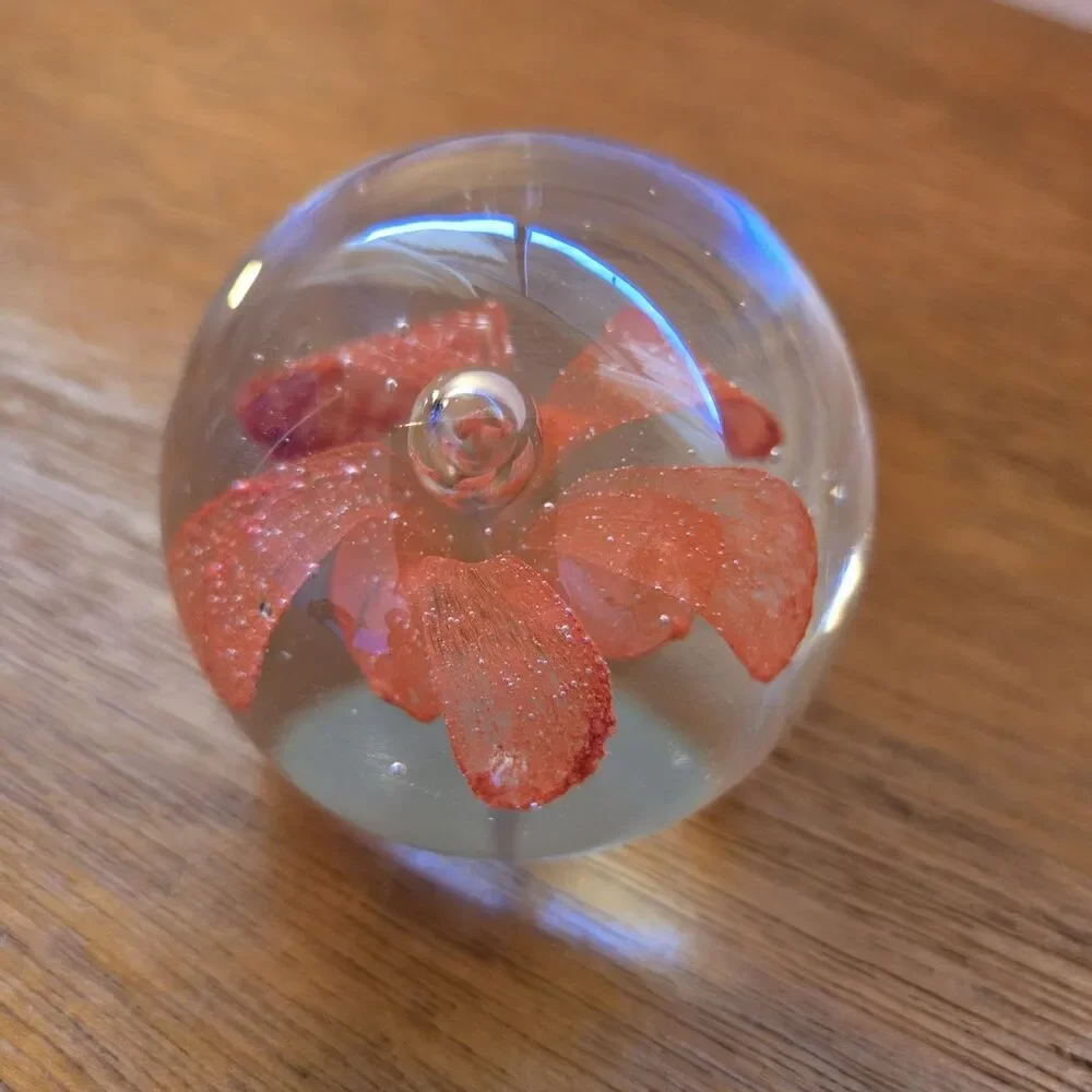 VINTAGE ART GLASS PAPERWEIGHT WITH ORANGE FLOWER INSIDE